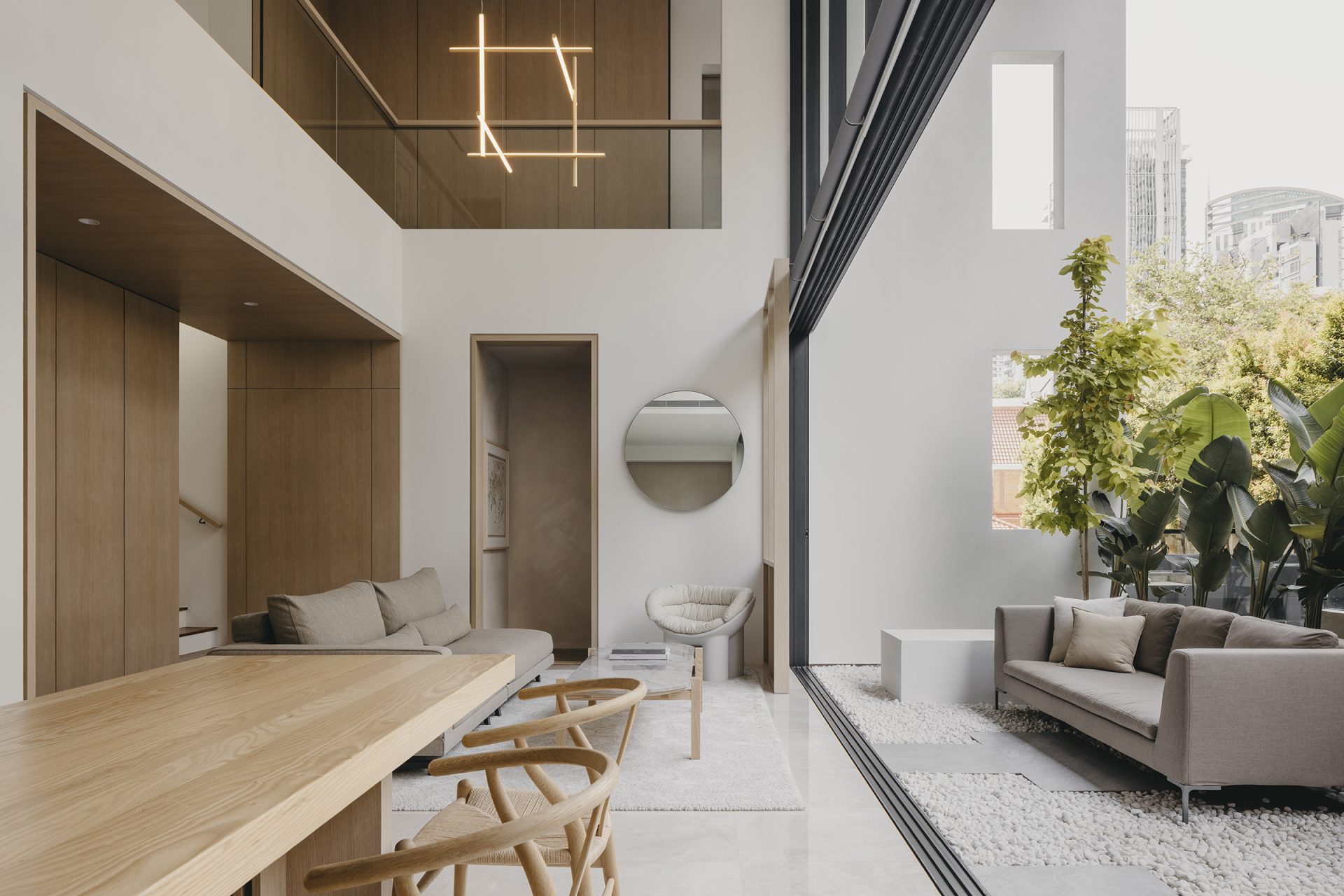 Duplex apartment in Novena by Right Angle Studio, living room and balcony