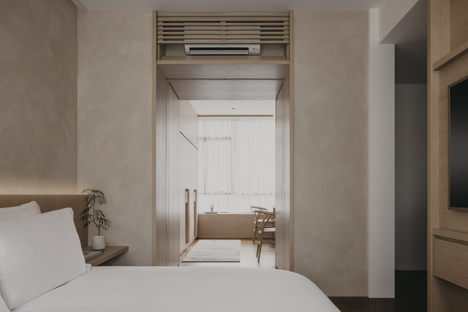 Duplex apartment in Novena by Right Angle Studio, master suite